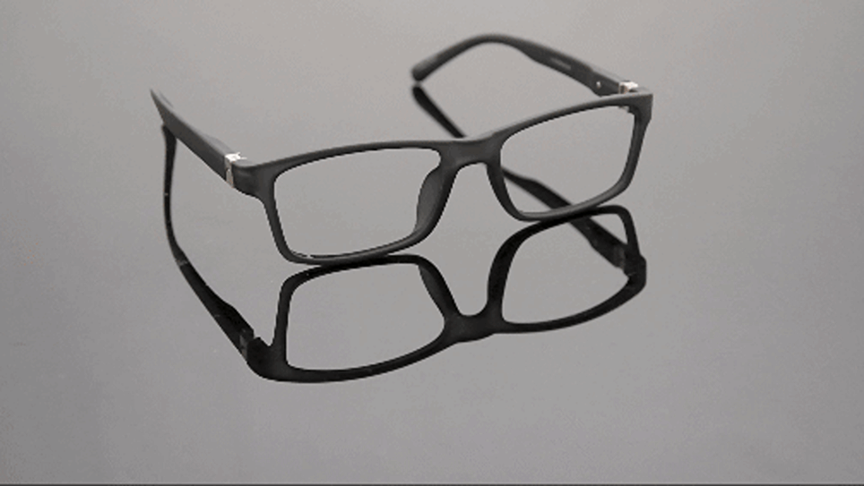 Animated GIF showing glasses with a clip shape guide on a reflective surface.