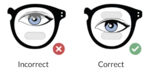 training prisms Diagram comparing incorrect and correct prism placements in glasses, with one showing misaligned prisms and the other showing properly aligned prisms.